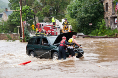 Irene 2011 - Emergency Workers rescue stranded driver