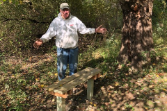 John Holt celebrates the installation of one of his three benches